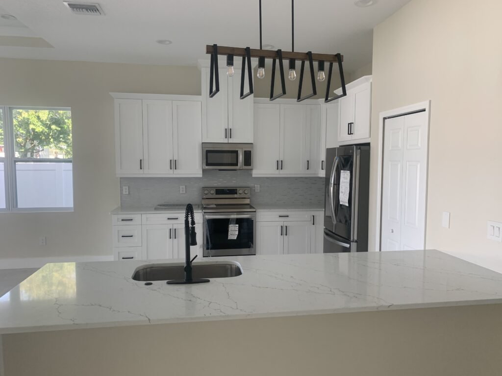 white-quartz-black-handles-tall-cabinets-Largo-FL