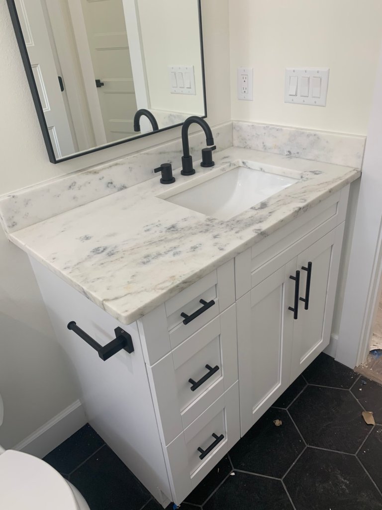 White kitchen cabinets installation in Brandon